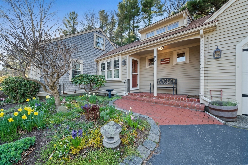 95 Wapping Road Kingston, MA 02364 - Photo 3 of 42 a front view of a house with garden