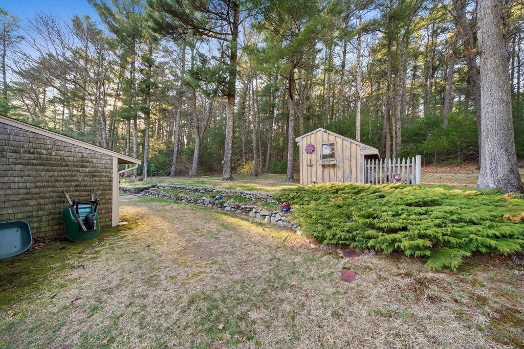 95 Wapping Road Kingston, MA 02364 - Photo 32 of 42 a front view of a house with garden