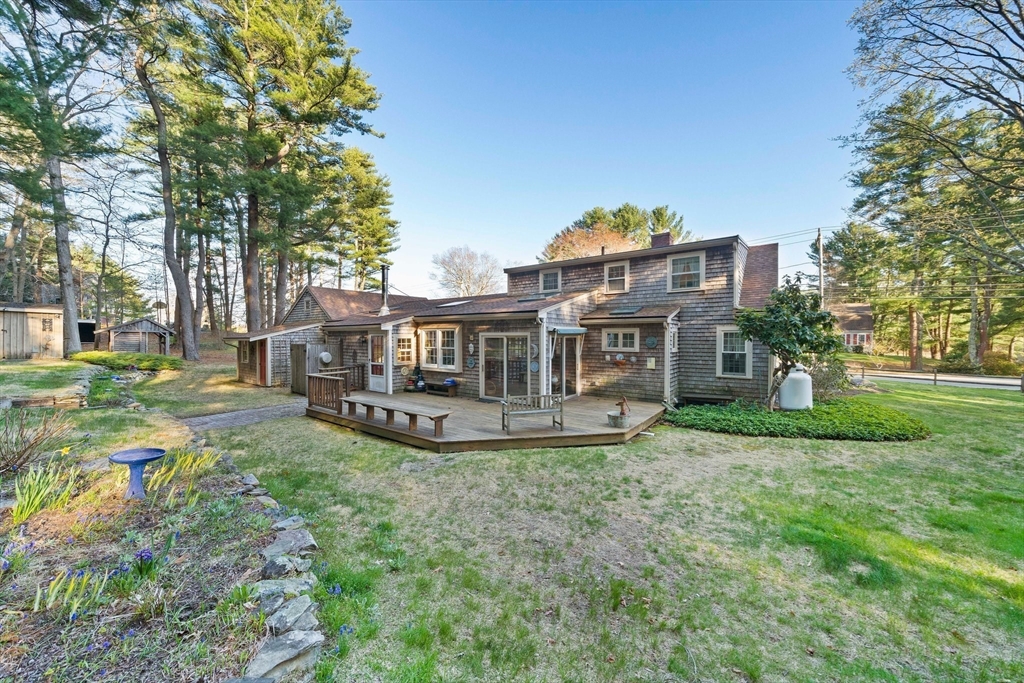 95 Wapping Road Kingston, MA 02364 - Photo 33 of 42 a view of a house with backyard and sitting area