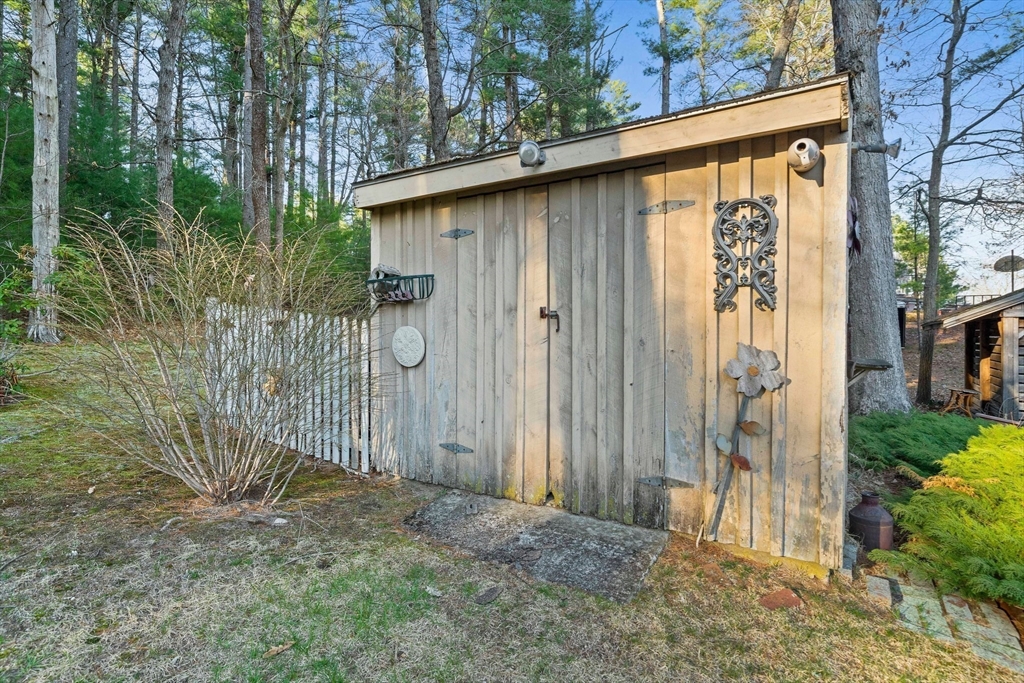 95 Wapping Road Kingston, MA 02364 - Photo 34 of 42 a backyard of a house with plants and tree