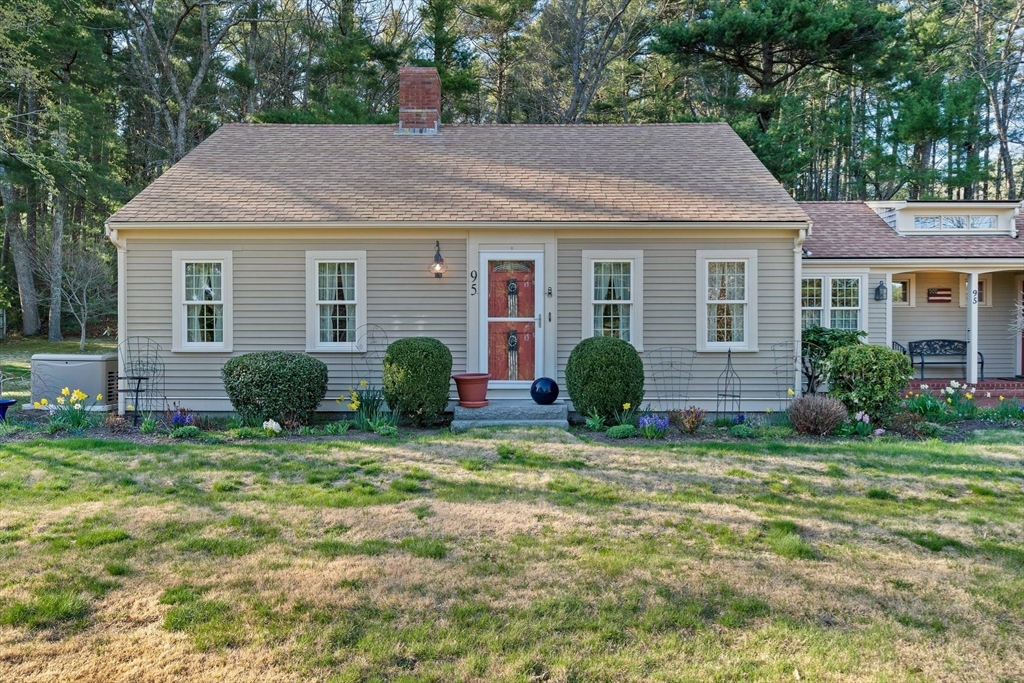95 Wapping Road Kingston, MA 02364 - Photo 37 of 42 a view of a house with a yard and plants