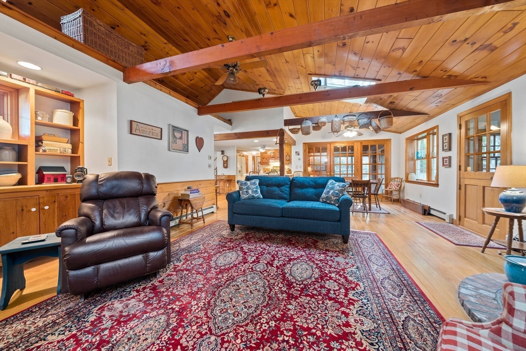 95 Wapping Road Kingston, MA 02364 - Photo 5 of 42 a living room with furniture and a rug