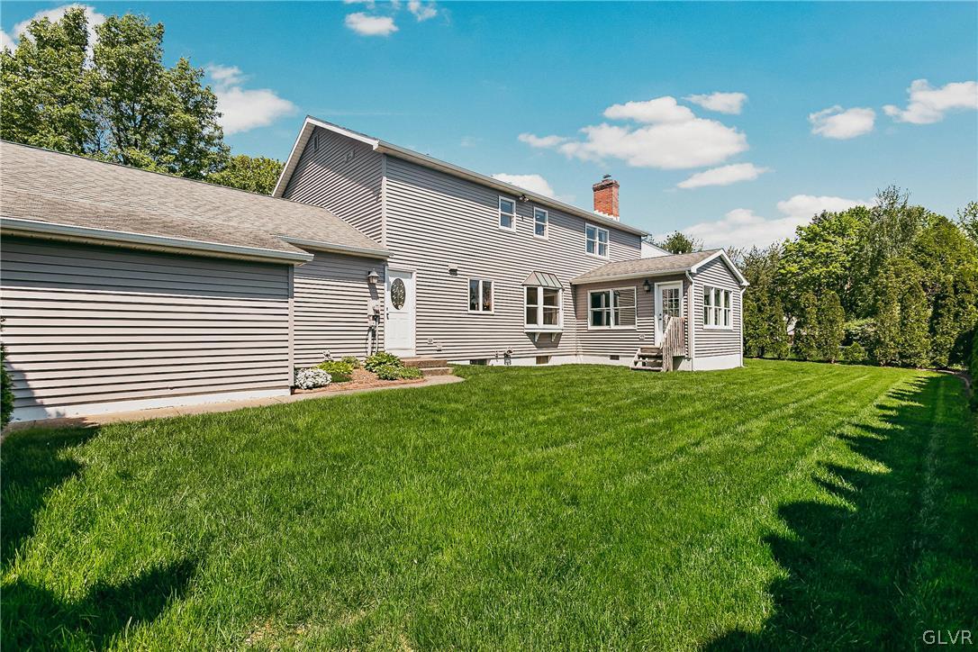 1339 Buck Trail Road Allentown, PA 18104 - Photo 22 of 30 Rear entrance & sunroom in incredibly private back