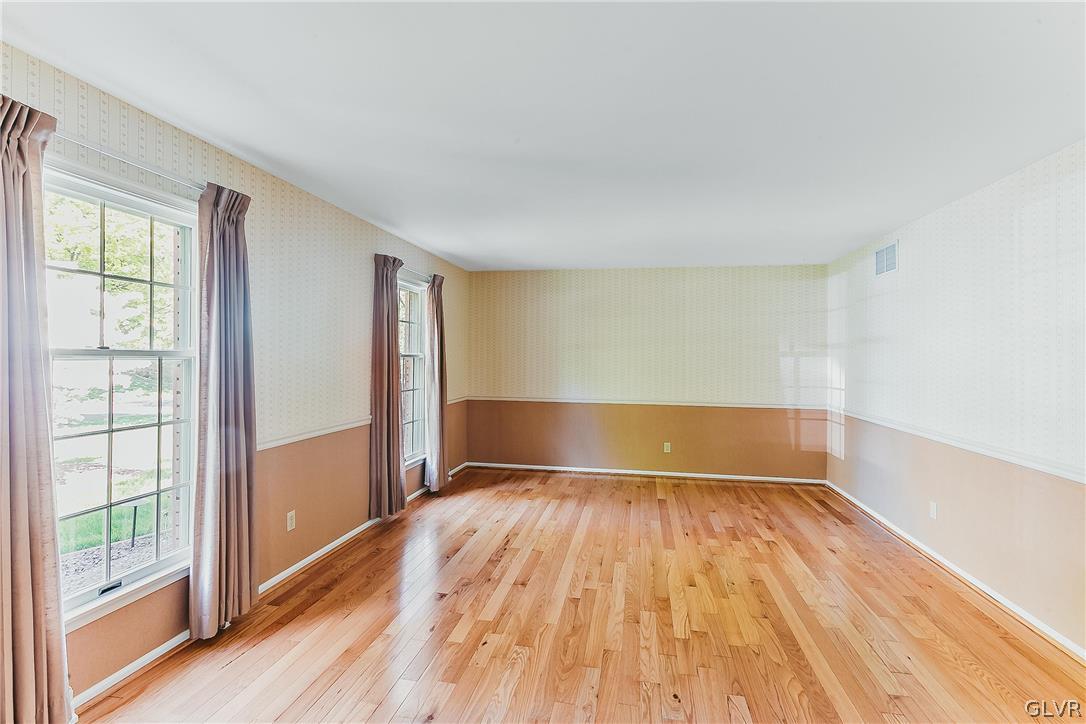 1339 Buck Trail Road Allentown, PA 18104 - Photo 9 of 30 1st Floor living room with natural light & wood fl