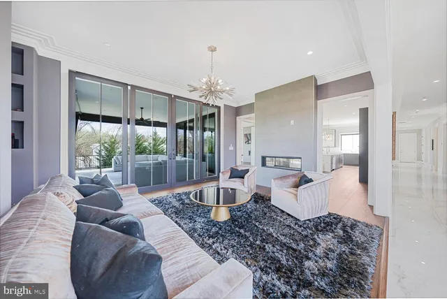 a kitchen with kitchen island a sink stove and cabinets