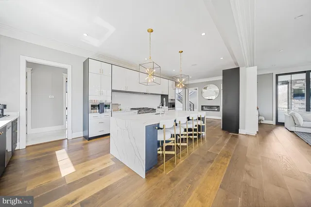 a spacious bedroom with a large bed and a large window