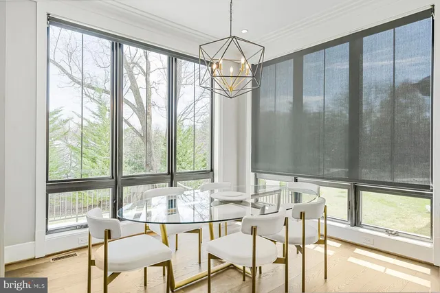 a living room with fireplace furniture and a flat screen tv