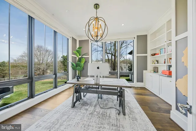 a bathroom with a double vanity sink mirror and bathtub
