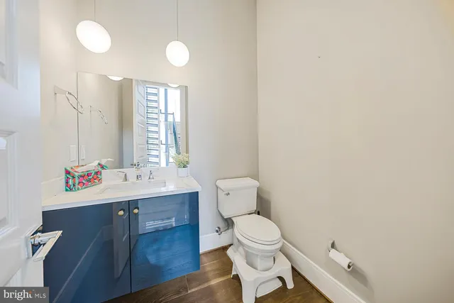a living room with furniture and windows