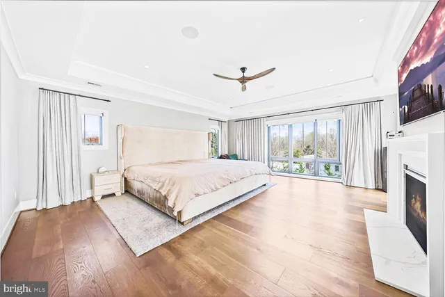 a bathroom with a sink vanity mirror and toilet