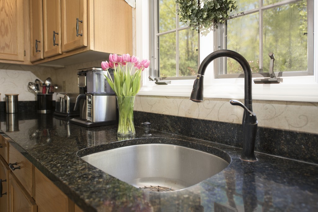 251 Ipswich Road Boxford, MA 01921 - Photo 3 of 27 a close view of sink and tap