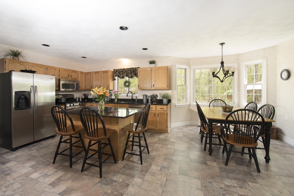 251 Ipswich Road Boxford, MA 01921 - Photo 7 of 27 a view of a dining room with furniture