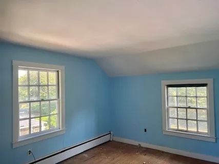 a bathroom with a sink a toilet and a shower