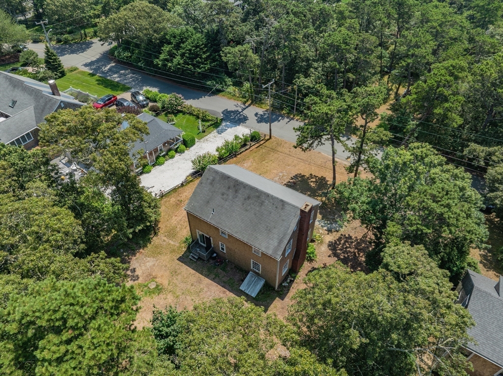 41 Woodland Road Chatham, MA 02659 - Photo 18 of 22 an aerial view of a house having yard
