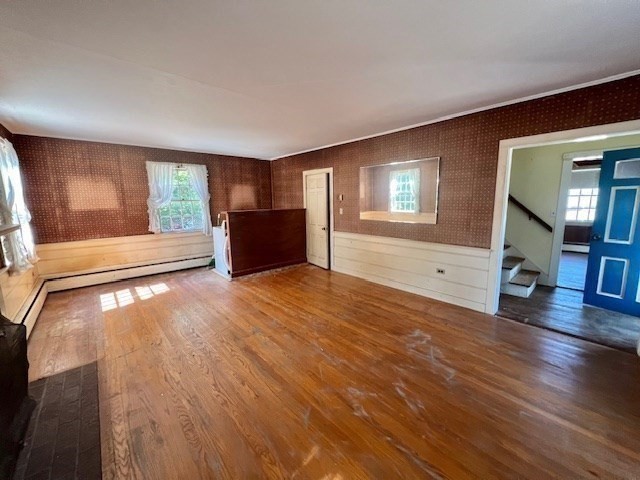 41 Woodland Road Chatham, MA 02659 - Photo 6 of 22 a view of livingroom with hardwood floor and a flat screen tv