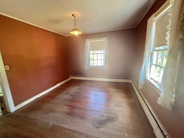 41 Woodland Road Chatham, MA 02659 - Photo 9 of 22 an empty room with wooden floor and windows