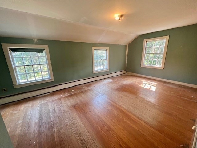 41 Woodland Road Chatham, MA 02659 - Photo 10 of 22 a view of an empty room with wooden floor and a window
