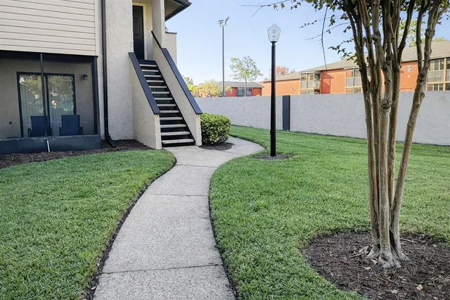 a view of a porch with a tree