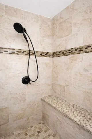 a bed room with a bed and a tv