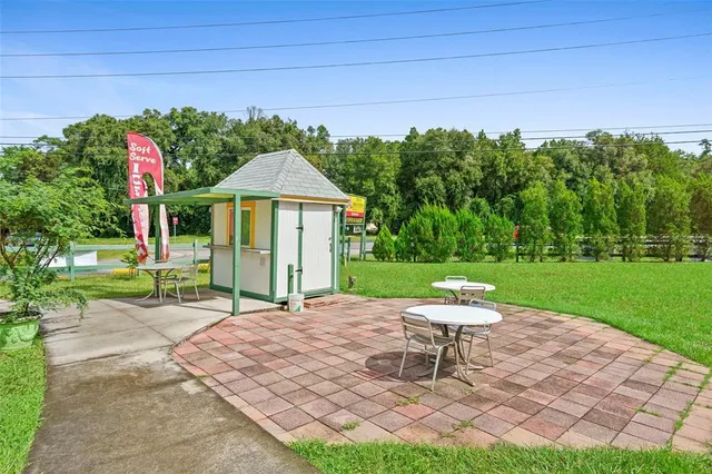 a room with lots of wooden furniture and a wooden floor