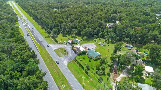 a room with table and chairs