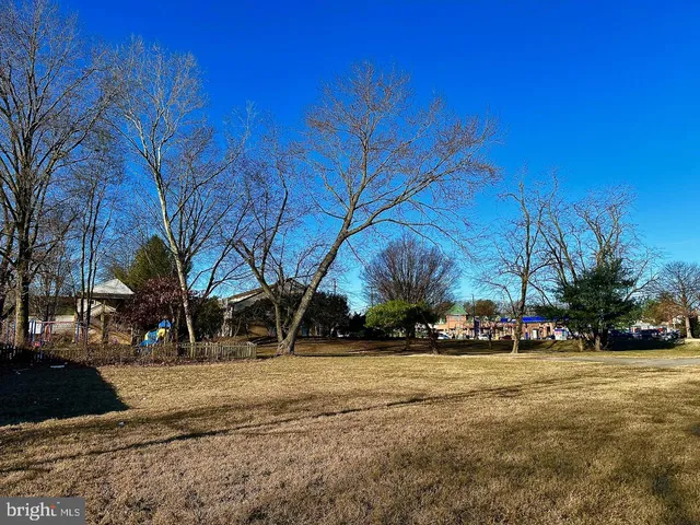 a view of road with with lots of buildings