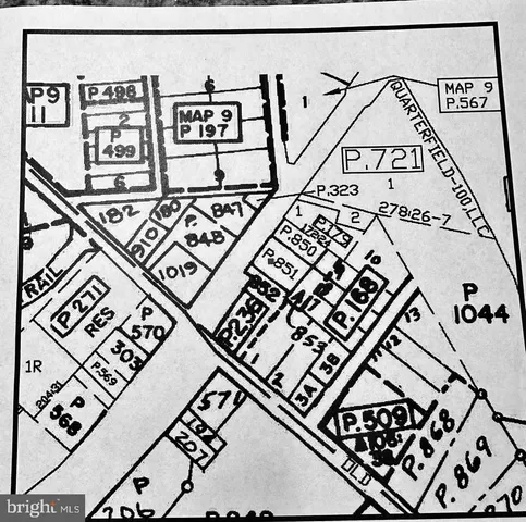 a view of a street with houses