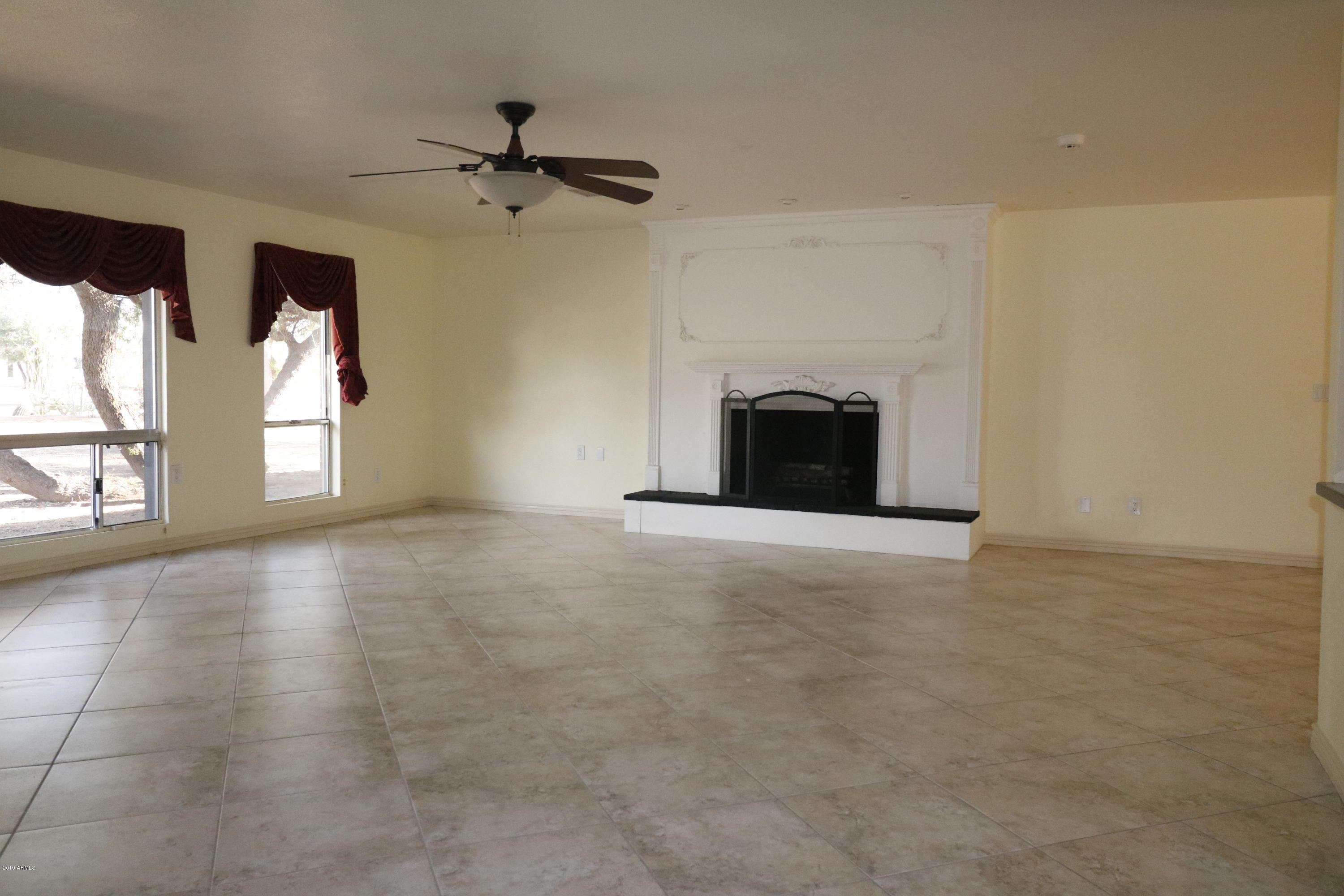357 North Ronda Paula Street Casa Grande, AZ 85122 - Photo 3 of 42 3 LR fireplace