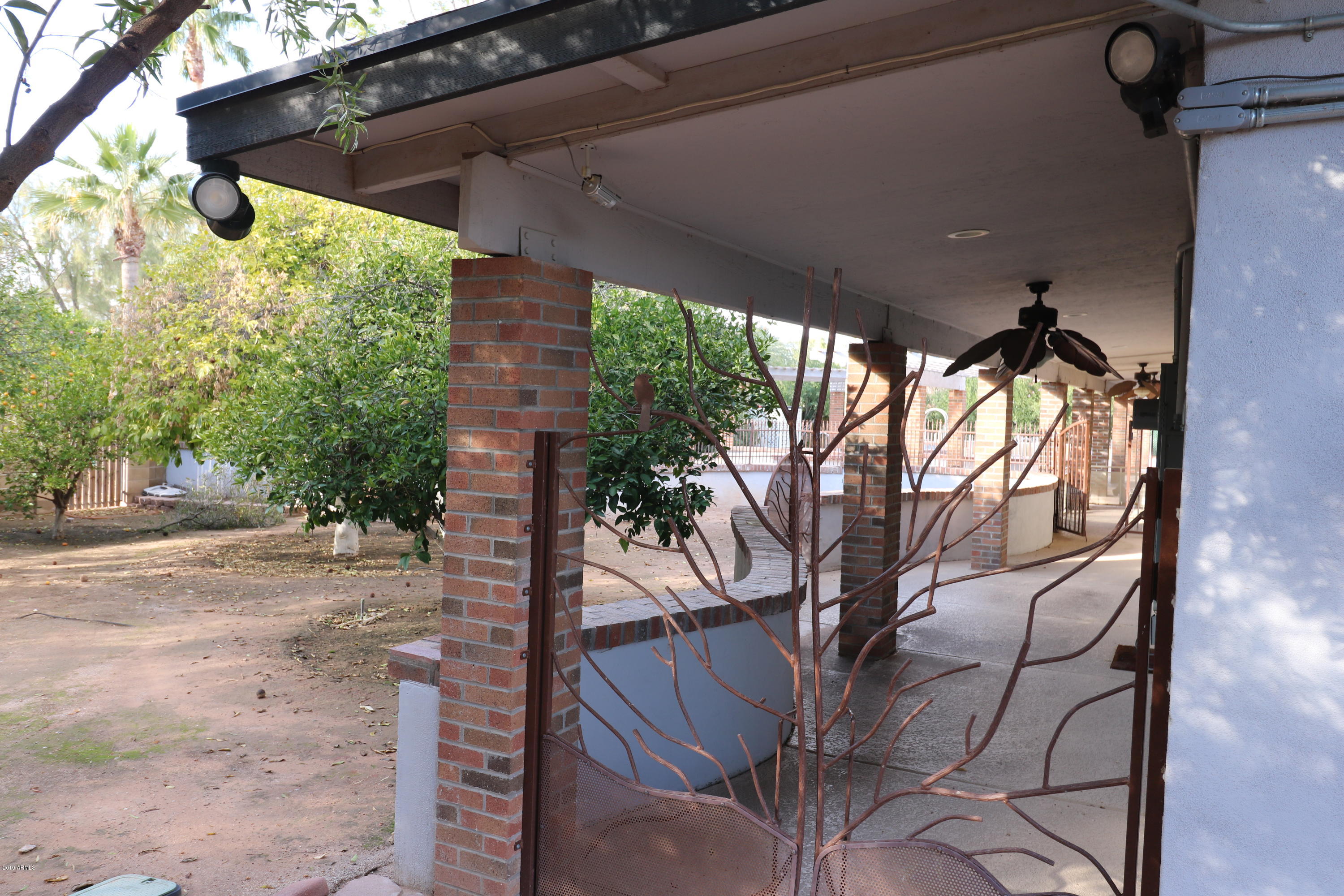 357 North Ronda Paula Street Casa Grande, AZ 85122 - Photo 36 of 42 36 iron gates