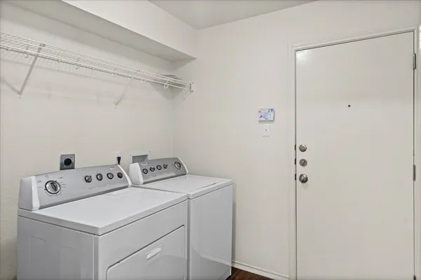 a utility room with dryer and washer