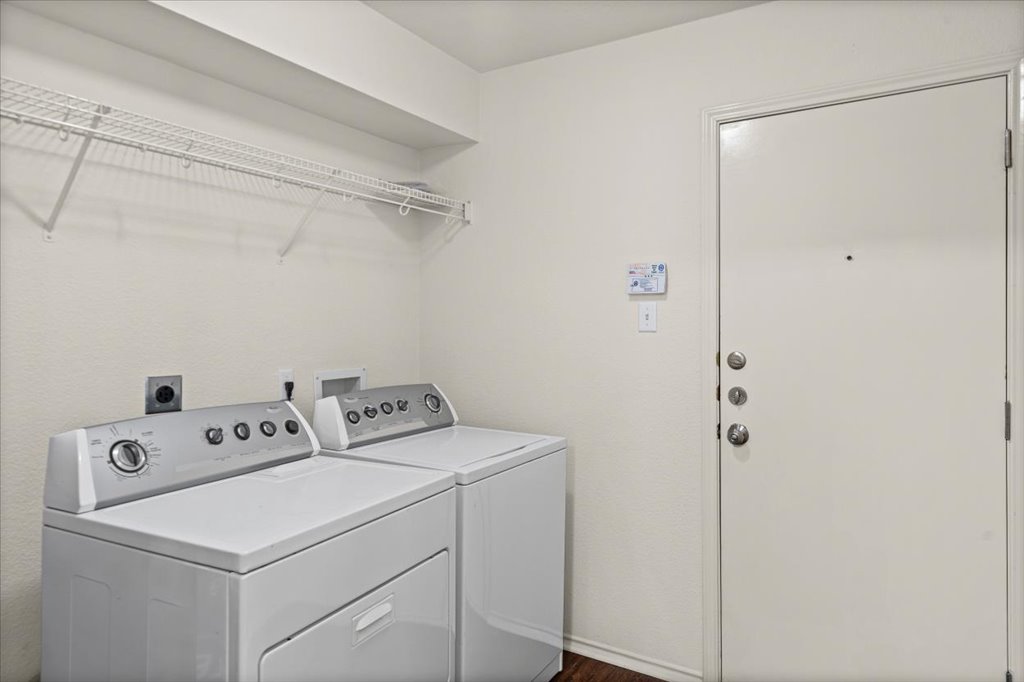 1316 Davis Mountain Loop Cedar Park, TX 78613 - Photo 8 of 24 a utility room with dryer and washer