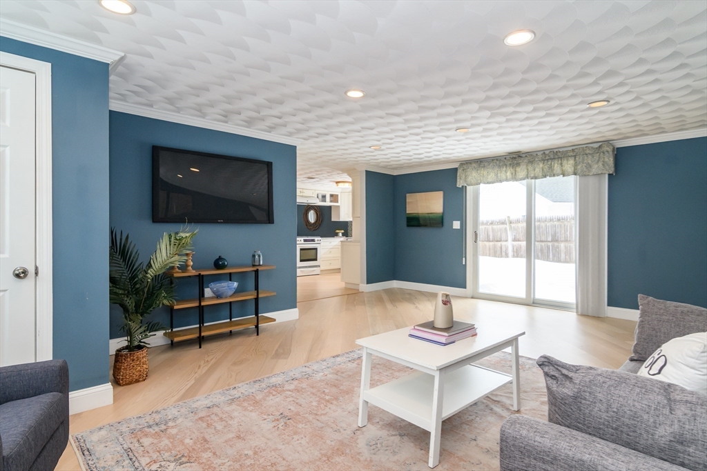 3 Oxbow Road Natick, MA 01760 - Photo 14 of 26 a living room with furniture and a flat screen tv