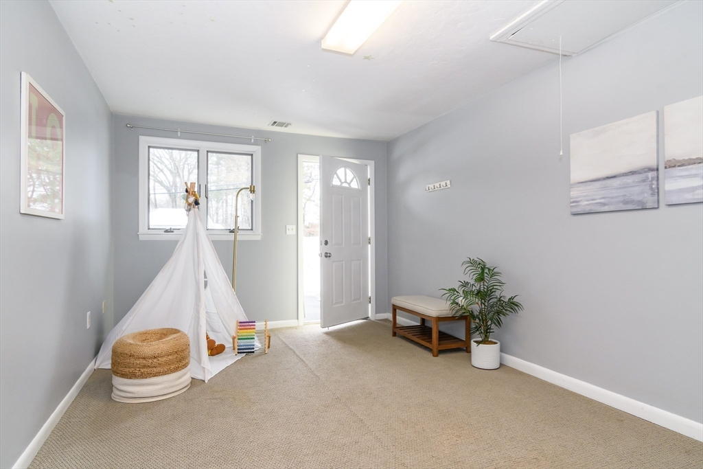 3 Oxbow Road Natick, MA 01760 - Photo 15 of 26 a view of a room with toys and potted plants