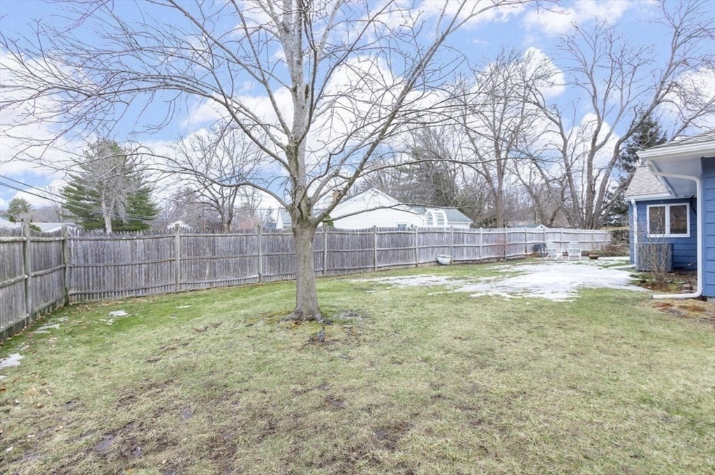 3 Oxbow Road Natick, MA 01760 - Photo 24 of 26 a view of a backyard with a small tree