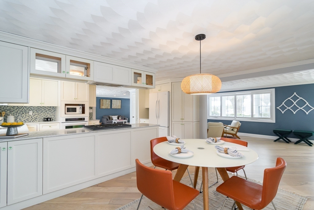 3 Oxbow Road Natick, MA 01760 - Photo 6 of 26 a view of a dining room with furniture and window