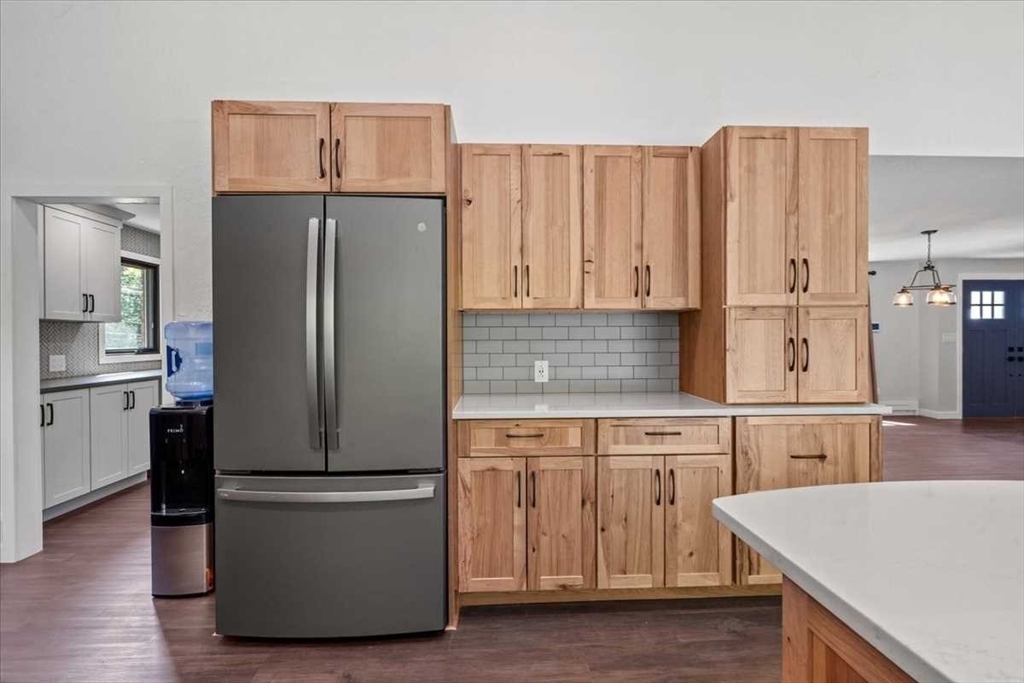 26 West Temple Street Boylston, MA 01505 - Photo 12 of 42 a kitchen with stainless steel appliances a refrigerator and a stove