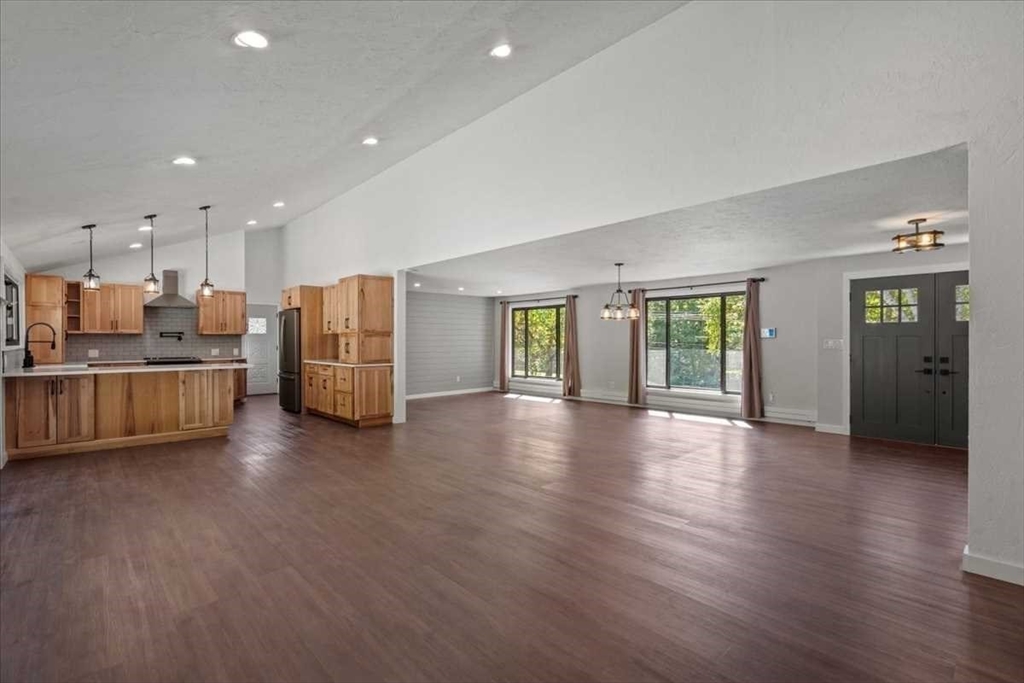 26 West Temple Street Boylston, MA 01505 - Photo 15 of 42 a view of kitchen with furniture and wooden floor
