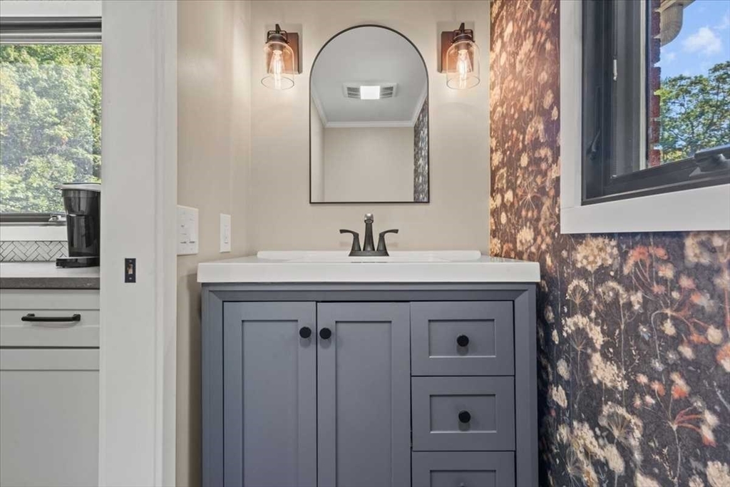 26 West Temple Street Boylston, MA 01505 - Photo 16 of 42 a bathroom with a sink and a mirror