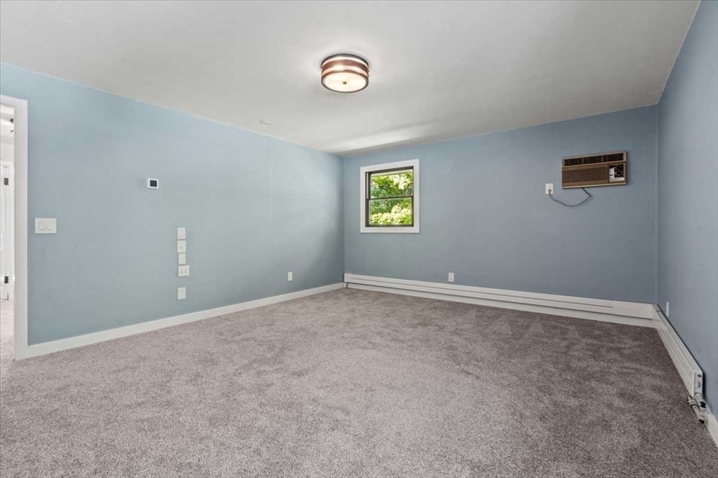 26 West Temple Street Boylston, MA 01505 - Photo 21 of 42 an empty room with a window