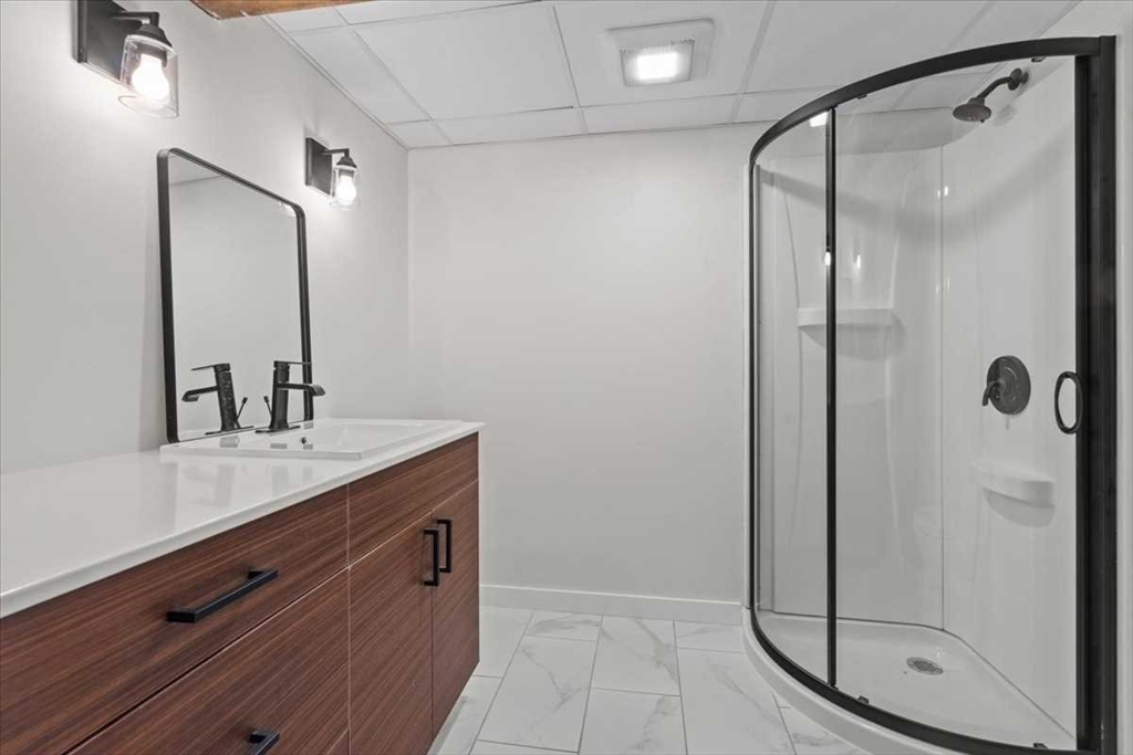 26 West Temple Street Boylston, MA 01505 - Photo 29 of 42 a bathroom with a granite countertop shower sink and mirror