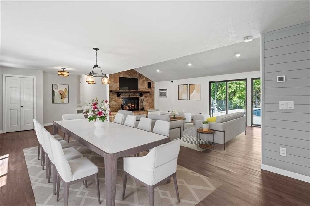26 West Temple Street Boylston, MA 01505 - Photo 3 of 42 a view of a dining room with furniture window and wooden floor