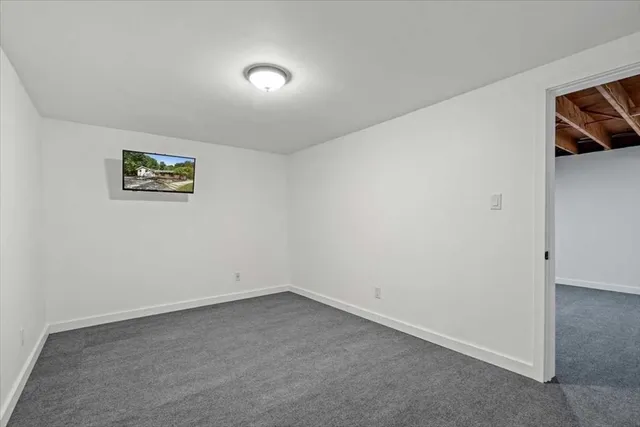 a view of a swimming pool with an outdoor seating