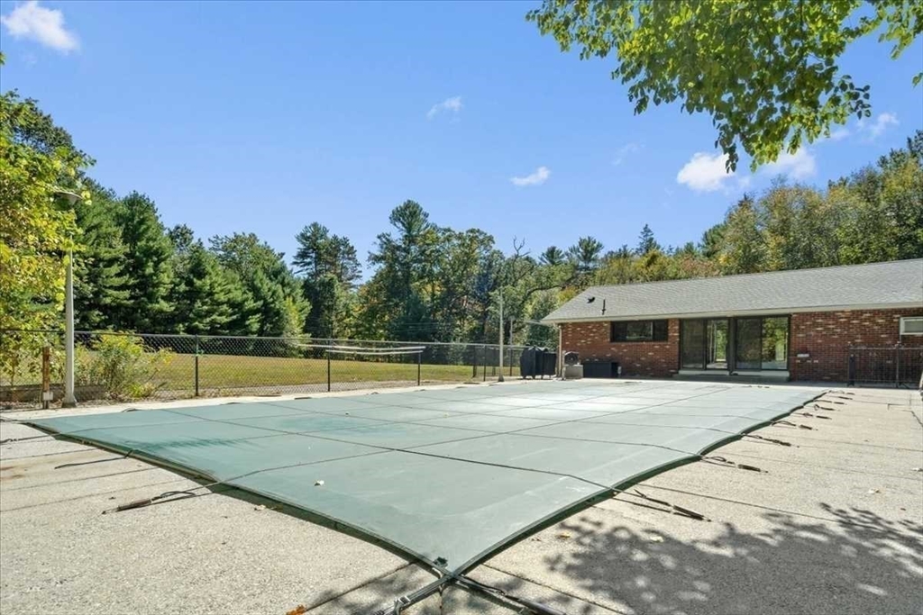 26 West Temple Street Boylston, MA 01505 - Photo 34 of 42 a view of a swimming pool with a patio