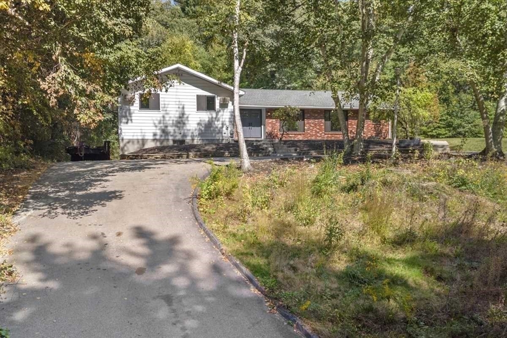 26 West Temple Street Boylston, MA 01505 - Photo 35 of 42 a view of a house with a yard