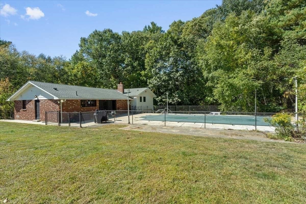 26 West Temple Street Boylston, MA 01505 - Photo 36 of 42 a house with trees in the background