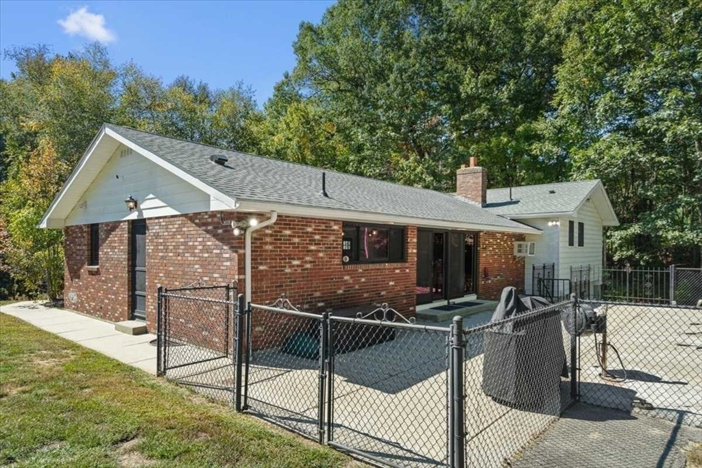 26 West Temple Street Boylston, MA 01505 - Photo 37 of 42 a view of a chairs and table in the patio