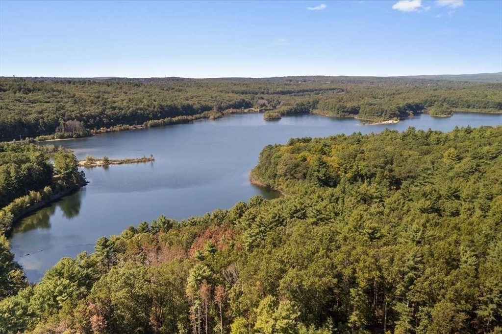 26 West Temple Street Boylston, MA 01505 - Photo 40 of 42 a view of a lake with houses in the back