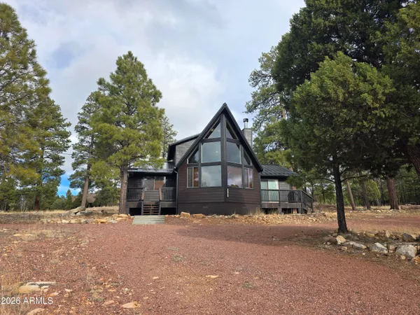 a view of house with a outdoor space