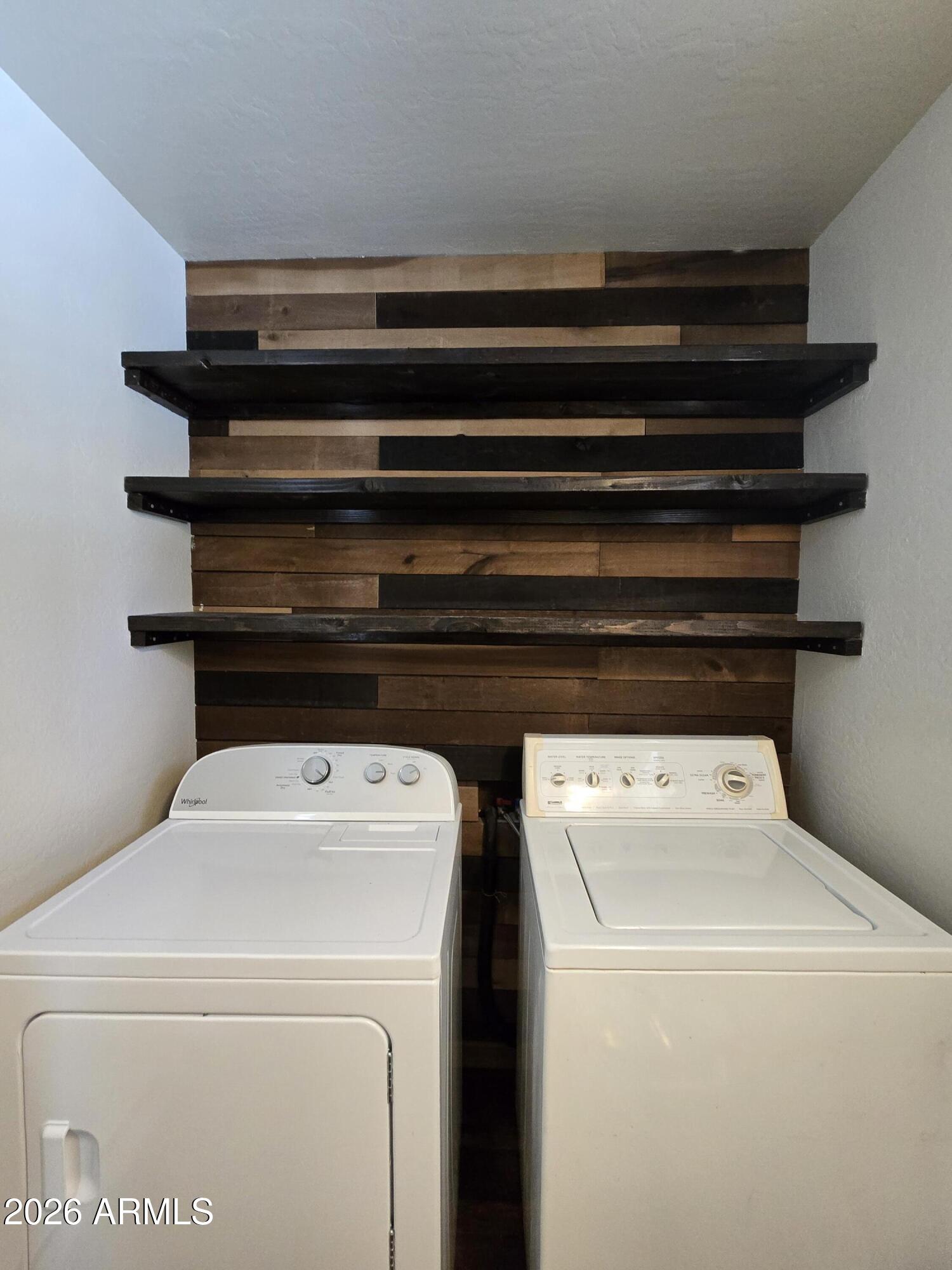2795 Coyote Ridge Happy Jack, AZ 86024 - Photo 14 of 31 a close up view of washer and dryer with washer