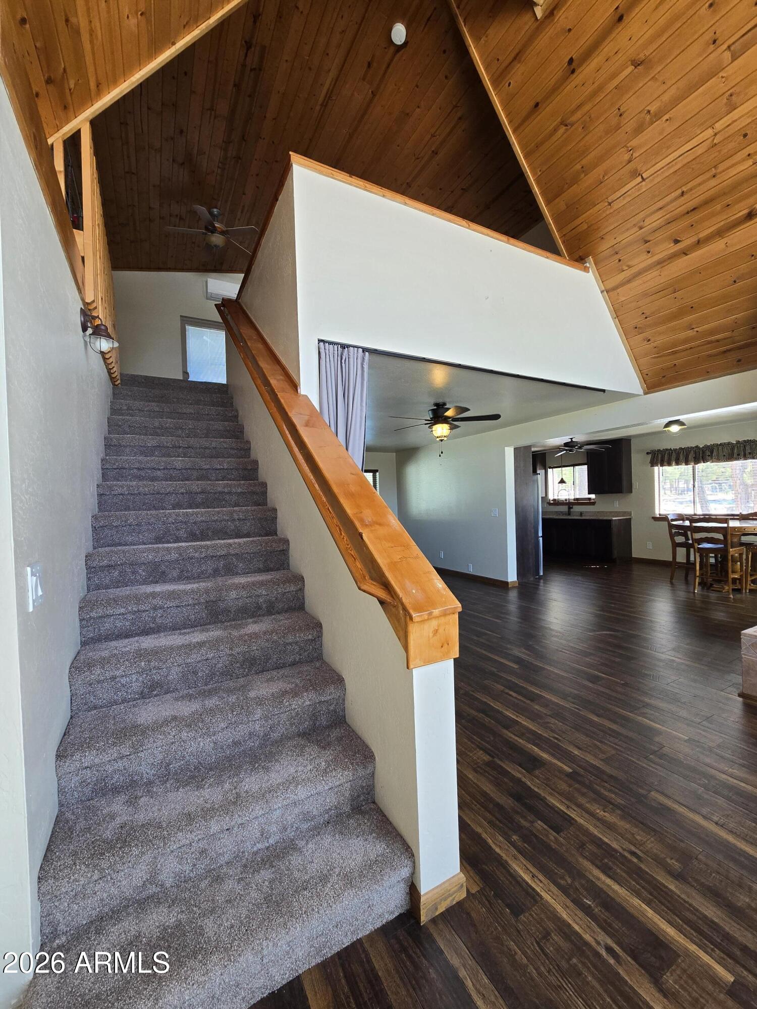 2795 Coyote Ridge Happy Jack, AZ 86024 - Photo 7 of 31 a view of entryway and hall with wooden floor
